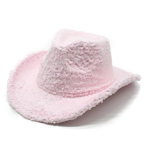 Close-up detail of the pink plush fabric and wide brim texture of the western cowboy hat