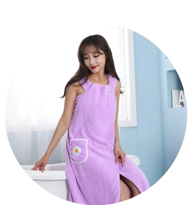 Detail of purple waffle weave bathrobe featuring a daisy pocket and adjustable straps