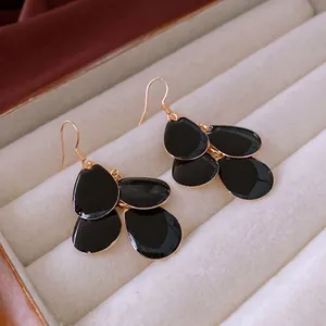 Retro gold hook earrings with three-layer black enamel water drop fringe petals