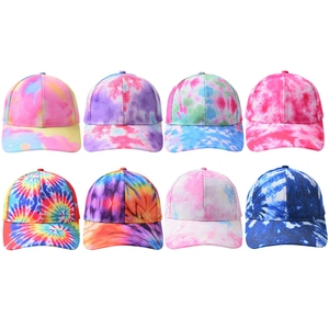 Group of 8 colorful tie-dye baseball caps with curved brims in a neat matrix display