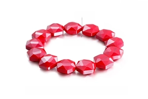 Detail of red geometric crystal beaded bracelet with 14mm width dimensions and weight