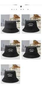 Detail view of various vintage washed cotton bucket hats with limited edition embroidery