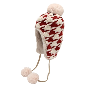 Winter houndstooth trapper hat with pink pom-poms and warm ear flaps for women
