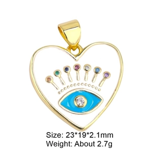 Macro shot of evil eye heart pendant with colorful zircons and golden edges