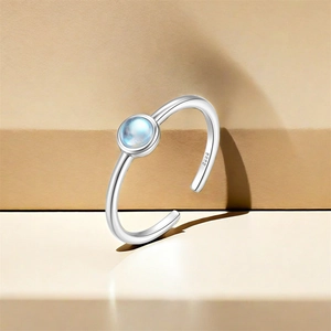 Detailed close-up of S925 sterling silver open ring with a round moonstone gemstone