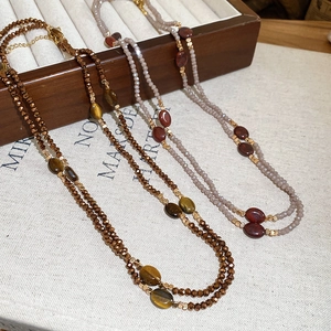 Ethnic style long beaded necklaces with tiger eye stones and carnelian charms