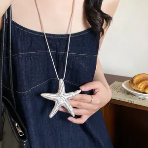 Vintage oversized starfish pendant necklace with matte silver texture on a snake chain