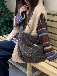 Deep grey plush heart tote bag with white polka dots for winter shopping comfort