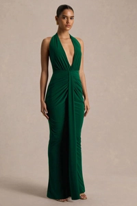 Detail of the deep green halter V-neck maxi dress with pleated waist and side slit