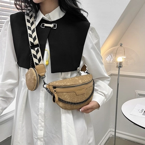 Khaki lace floral chest bag with black metal chain and geometric woven strap