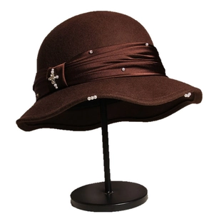 Elegant dark brown wool cloche hat with ruffled satin ribbon and pearl cross decoration
