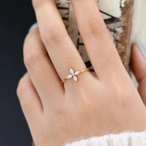 Detailed macro view of S925 silver gold-plated ring with marquise zircon flower design