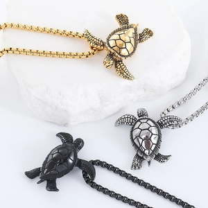 Polished stainless steel sea turtle pendant necklace in gold, silver, and black finishes