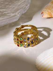 Detail of multi-layer 18K gold-plated titanium steel ring with colorful zircon stones
