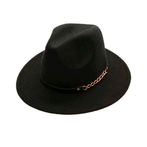 Detail of classic black wool felt fedora with a decorative golden chain strap