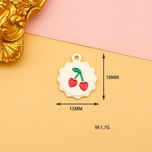 Detailed view of white enamel cherry charm with dimensions 18mm by 15mm and 1.7g weight