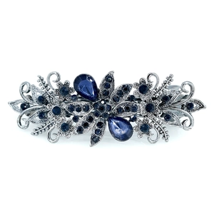 Pince à cheveux vintage argentée avec strass bleus et motifs floraux élégants