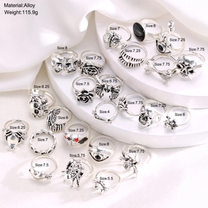 24-piece vintage gothic punk ring set with skull and spider motifs in silver finish