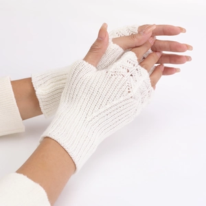 Detailed knit texture and thumb hole design of beige fingerless wool gloves