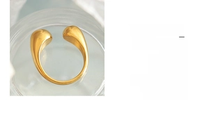 Detail view of 18k gold plated stainless steel ring with elegant double drop design