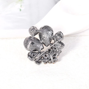 Elegant dark grey crystal brooch with secure safety pin clasp for stylish women's clothing