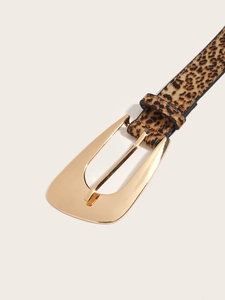 Close-up of leopard print belt with a polished large gold metal buckle on a plain background