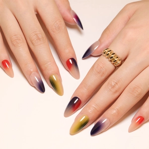 Rainbow gradient almond press-on nails with glossy finish and colorful ombré design
