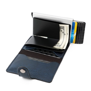 Detail of RFID blocking wallet with blue litchi leather, metal clip and pop-up card slot