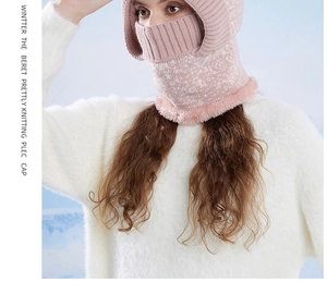 Detailed knit texture and soft pink faux fur trim of the winter integrated beanie scarf