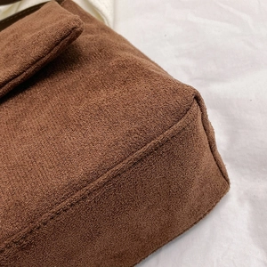 Brown vintage frosted leather crossbody bag with detailed stitching for spring fashion