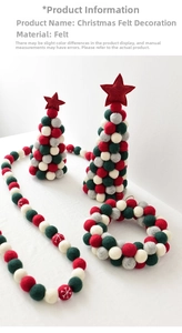 Close-up of wool felt Christmas tree decorations and colorful festive pom-pom garlands