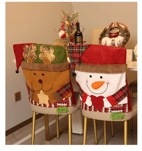 Detailed Christmas chair covers featuring festive reindeer and snowman knitted designs