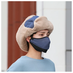 Detail of warm winter trapper hat and face mask with thick faux fur lining for cold weather