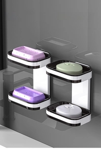 Vertical wall-mounted four-tier soap holder with rotating trays for bathroom drainage