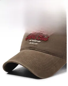 Close-up of brown cotton baseball cap featuring detailed Ford Club embroidery and stitching