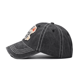 Vintage washed cotton baseball cap with Good Vibes embroidery and distressed brim