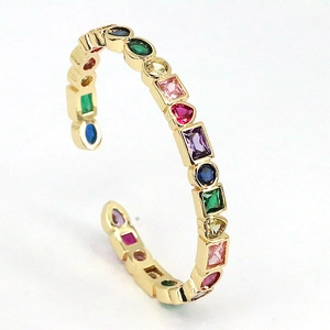 Bohemian 18K gold open bangle with multicolored zircon stones in various cuts