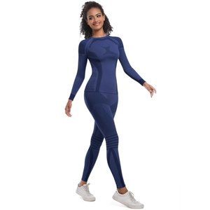 Detail showing seamless dark blue compression fabric texture and breathable ribbing for sports