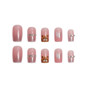 Pink glitter press-on nails with cartoon tiger, rhinestones and heart designs