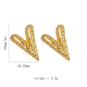 Polished 18k gold stainless steel heart studs with unique hammered texture design