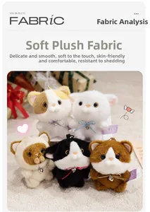 Detailed view of five plush cat keychains with heart bells and soft fabric texture
