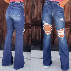 Women's high waist distressed flared jeans with ripped knees in deep blue wash denim