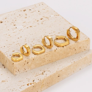 Polished gold square stainless steel geometric earrings displayed in various sizes