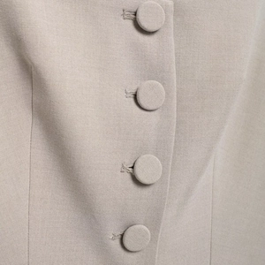 Short sleeve square neck tweed jacket with fitted waist and fabric covered buttons