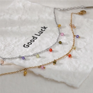 Minimalist stainless steel jewelry set with colorful faceted beads in gold and silver finish
