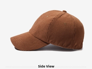 Detailed side view of brown corduroy baseball cap showing fine ribbed fabric texture