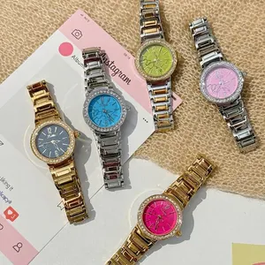 Montres à quartz pour femmes avec lunette en strass et cadran texture marbre en cinq coloris