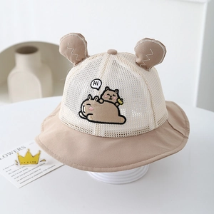 Detail of baby sun hat featuring bear embroidery and cute decorative 3D ears