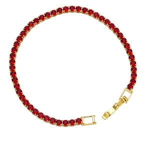 Classic gold-plated tennis bracelet featuring round-cut deep red cubic zirconia stones