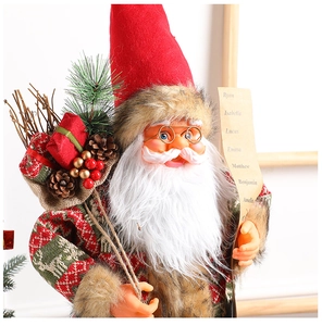 Close-up of Santa doll with detailed knit textures, scroll and pinecone accessories